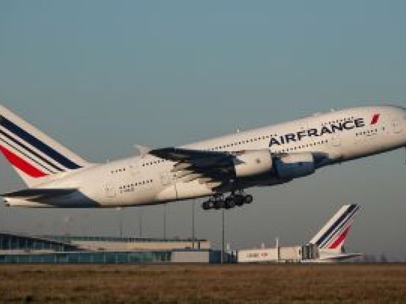 Air France plane taking off from runway left to right