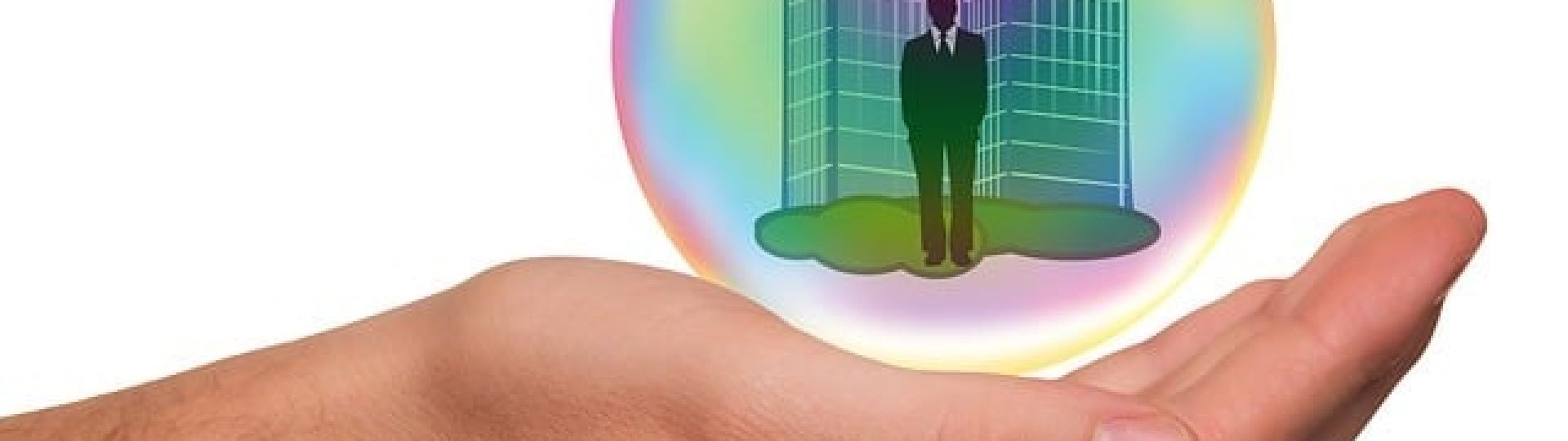 A hand holding a bubble containing businessman standing in front of an office building